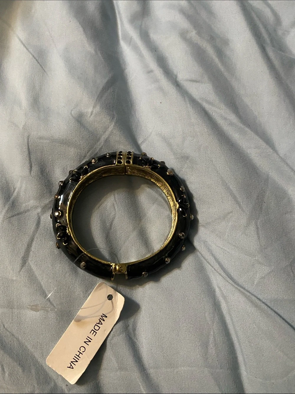 Gold-Tone Hinged Bangle Bracelet with Black Enamel and Studs